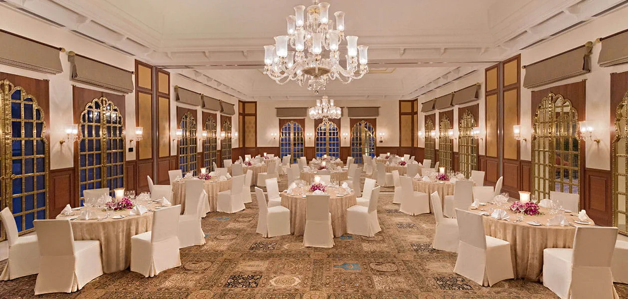 Elegant banquet hall with chandeliers at The Oberoi Sukhvilas Resort